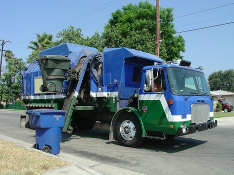 Professional office clearance team removing furniture from an office