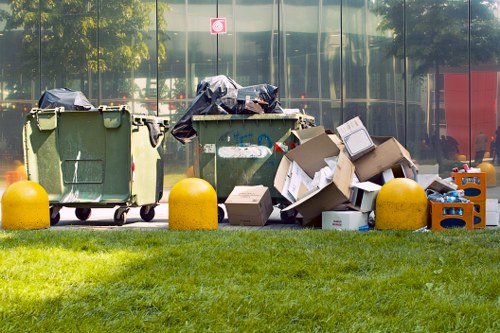 Professionals organizing a cluttered garage in Edmonton